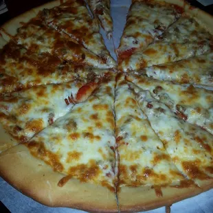 a pizza with a slice taken out of it