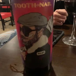 a glass of wine and a bottle of wine