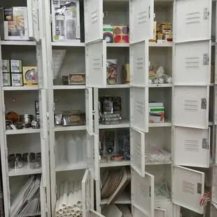Love it! Repurposed school locker, offer everything from biscuit cutters to Cusinart food processir replacement lids.