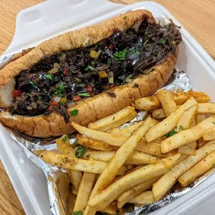 Oxtail Cheesesteak with Jerk Sauce and French Fries | Instagram: @telephonesmoothie