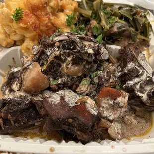 Brown stew chicken w/ white sauce.  Mac &amp; collard greens