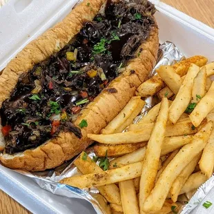 Oxtail Cheesesteak with Jerk Sauce and French Fries | Instagram: @telephonesmoothie