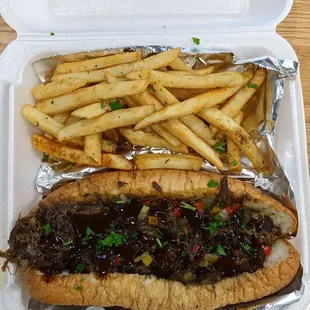 Oxtail Cheesesteak with Jerk Sauce and French Fries
