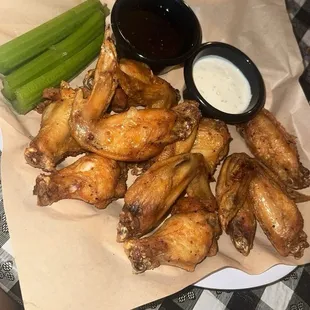 Wings with a side of ranch and another dipping sauce (I asked for it separately) alongside celery.