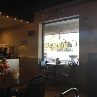 a table and chairs in a cafe