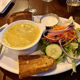 Potato cheddar soup, salad and Italian bread (?)