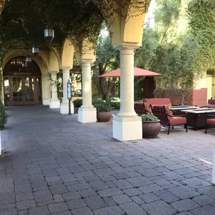 patio area with tables and chairs