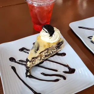 a slice of cake and a drink