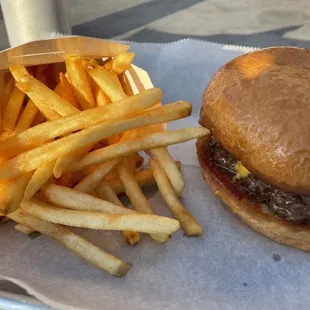 Cheeseburger and standard fries