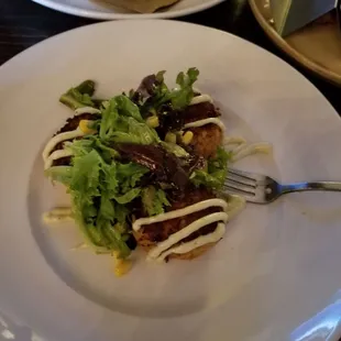 Appetizer of 3 crab and lobster cakes. I had as meal. Delicious.