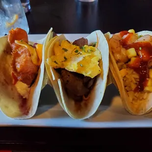 Left to Right: Great Lakes beer battered Walleye taco, Flank Steak Banh Mi taco, Shrimp taco
