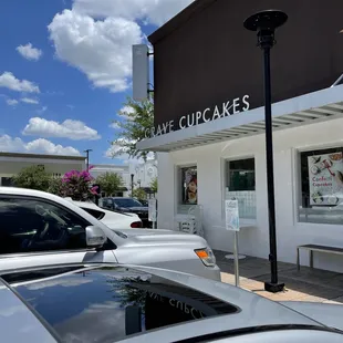 cars parked in front of the store