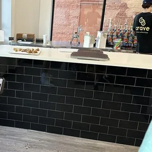 Pick up area where they have the samples to try.