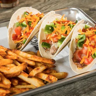 three tacoss and fries