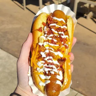 Loaded baked potato dog Tater tots, sour cream, bacon bits, and cheddar cheese IG: @the_n.c_foodie