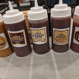 a row of ketchup bottles