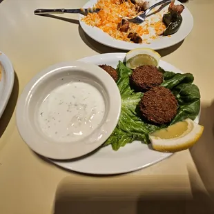 wo plates of food on a table