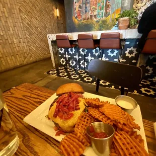 a plate of fries and a sandwich