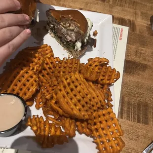 Chicken sandwich and sweet potato Frys.