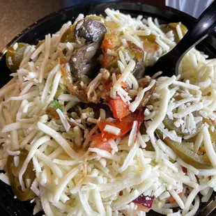 Chicken bowl. Too much cheese.