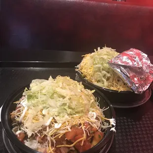 Burrito "bowls". One has tortilla wrapped and on the side.