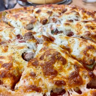  pizza with cheese and sausage