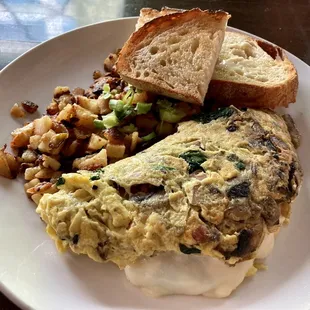 great omelet - spinach, mushroom, ham, and provolone cheese