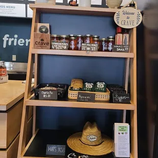 a shelf with a hat and other items