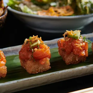Salmon Crispy Rice with yuzu gochujang, avocado, dill