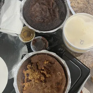 two pies and a cup of ice cream