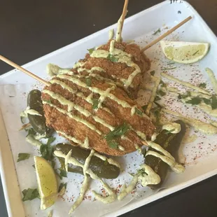 Chicken on a Stick with house made roasted poblano crema