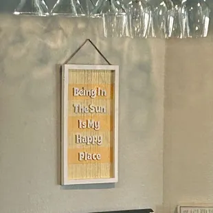 Cute sign behind the bar