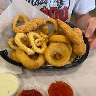 Combo fried basket with calamari and chicken tenders and onion rings