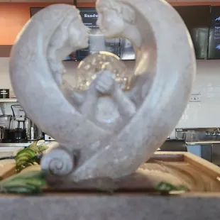 a woman behind a counter