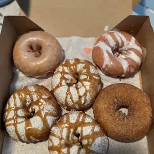 Original glaze (top left) - 3 Funnel Cake (bottom left/center) - Strawberry (top right) - French Toast (bottom right)