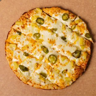 Veggie Cheese Sticks:-
10' bread, sour cream, mozzarella, cheddar, pineapple, onion, jalapenos served with a side of ranch sauce.