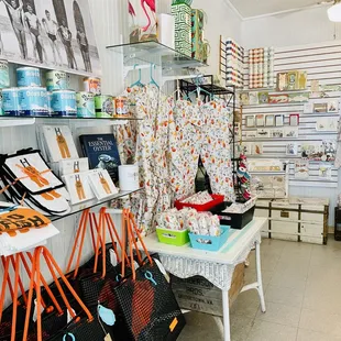 a variety of handbags and purses in a store