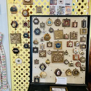 a collection of framed and unframed items