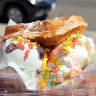 two scoops of ice cream with sprinkles