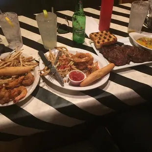 three plates of food on a table