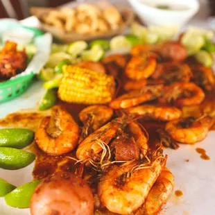 1lbs of shrimp cajun spices with corn and sausages