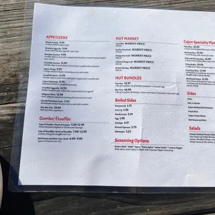 a menu on a wooden table