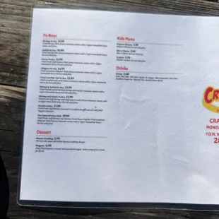 a menu on a wooden table