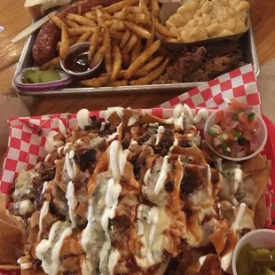 3-Meat plate (brisket, turkey and sausage) w/2 sides AND brisket nachos.