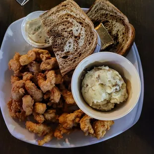 Crawfish dinner w/garlic mashed potatoes (skin on), coleslaw, and rye bread.