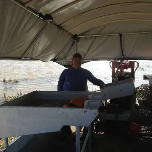 Our crawfish farm in Gueydan, Louisiana. The boat is on it&apos;s way out to get a fresh catch!