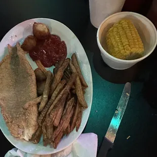 Catfish, fries and corn and hush puppies