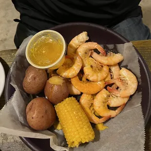 Cajun boiled shrimp with Cajun potatoes and corn