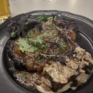 Ribeye with broccolini and mushroom pudding