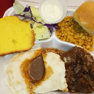 Hamburger steak, mashed potatoes, corn, salad with ranch, butter roll &amp; lemon cake plate $10.99